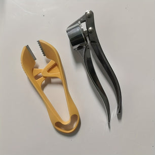 1pc Stainless Steel Garlic Peeler & Cutter – Manual Kitchen Tool for Easy Garlic Prep